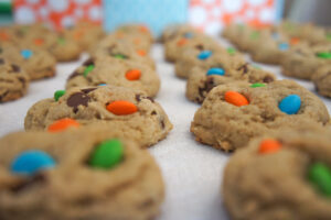 Cookies containing candy cooling, fresh from the oven.