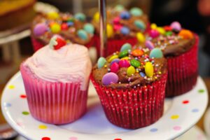 cupcakes topped with candy decorations