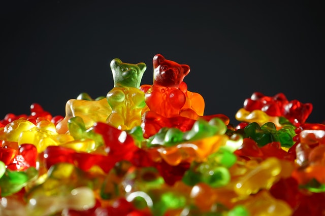 pile of green, red, yellow, and orange gummy bears